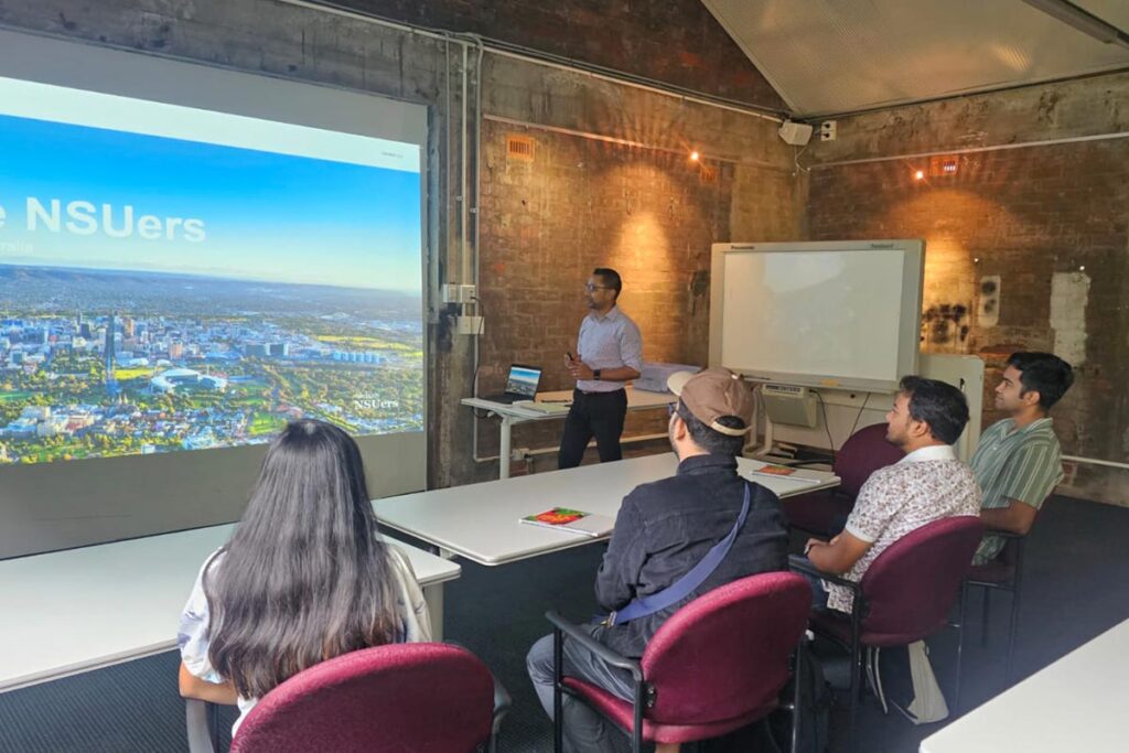 Speakers engaging with new NSUers in Adelaide during an interactive resume and career discussion session.